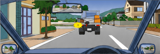 Driver following a cargo truck that is signaling a left turn