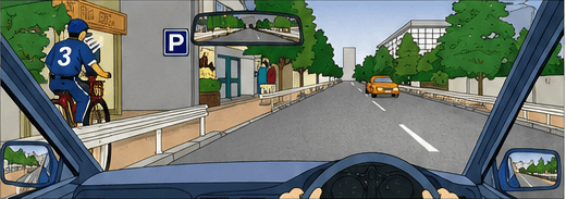 Driver approaching a cyclist who may move into the roadway near pedestrians