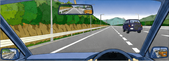 Driver preparing to merge onto an expressway behind another vehicle
